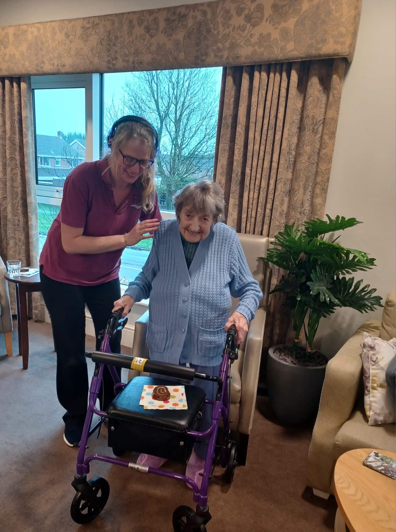 A physiotherapist with an older resident
